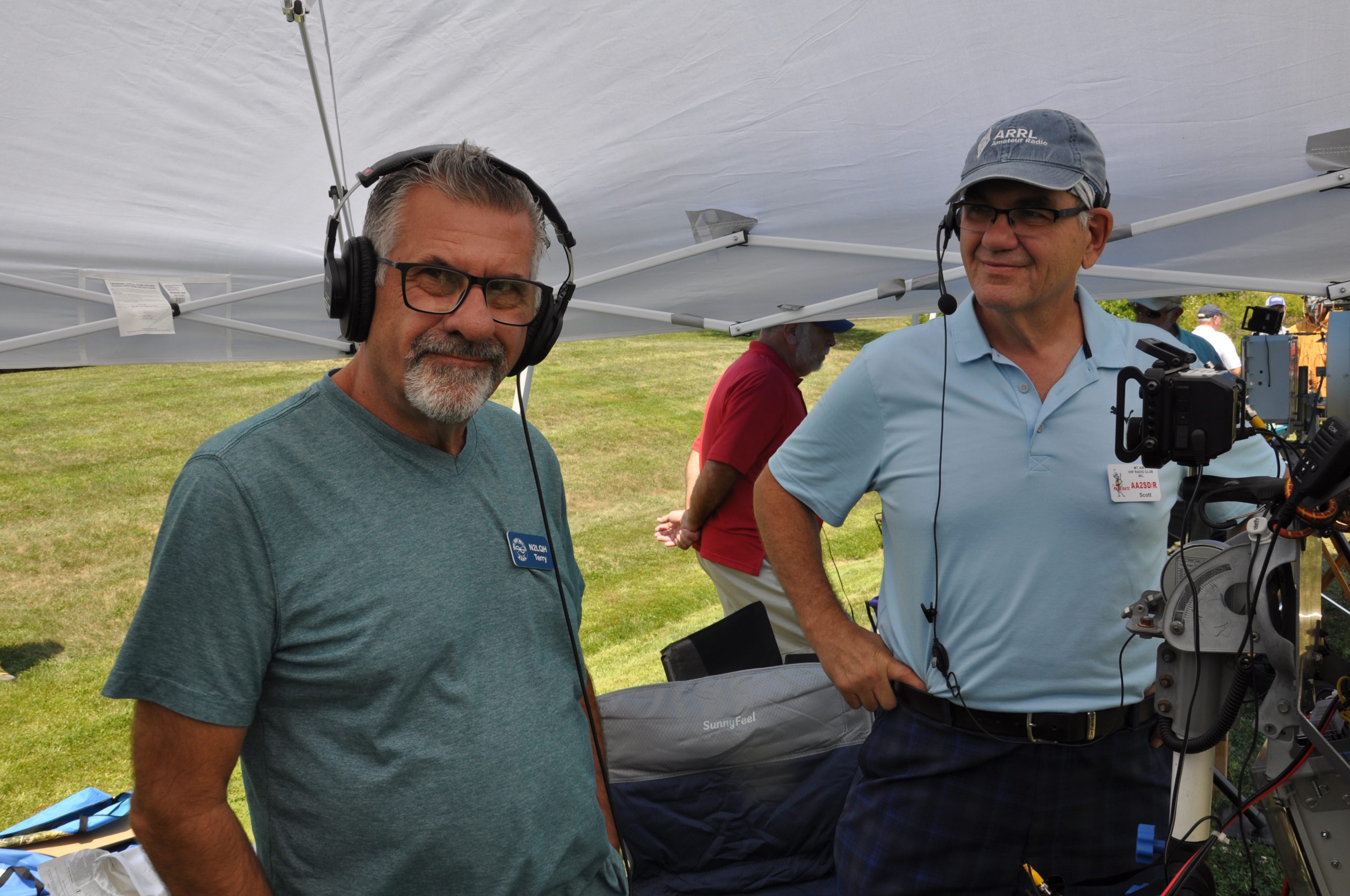 N2LQH Terry and Scott AA2SD standing together under a canopy