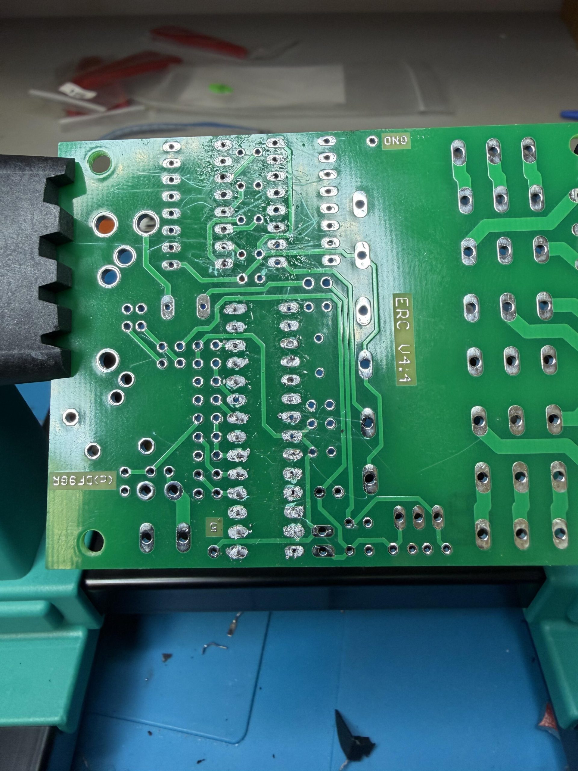 Bare ERC relay board PCB, back side, sparse silkscreen printing