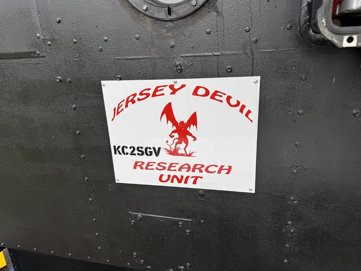 The Jersey Devil Research Unit sign on the satellite trailer