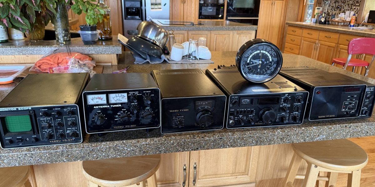 The complete Yaesu 301 line on the kitchen counter, world clock on top